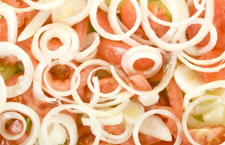 Tomato cucumber and onion salad; background, close up, macro viewの写真素材