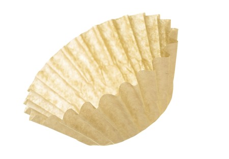 Unbleached coffee filter; isolated on white backgroundの写真素材