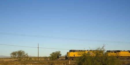 Freight train engine in desertの写真素材