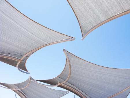Awnings against the blue sky backgroundの写真素材