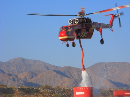 MORONGO, US  JUNE 16, 2013: Ericcson Sky Crane, also known as Sykorsky S-640, refills air tanker with fire retardant during Hathaway fire in San Bernardino National Forestのeditorial素材