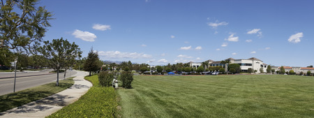 CAMARILLO, CA - APRIL 8, 2015: Semtech corporate headquarter office across perfectly manicured green grassy field in Camarillo, California; , Neighborhood Panoramaのeditorial素材