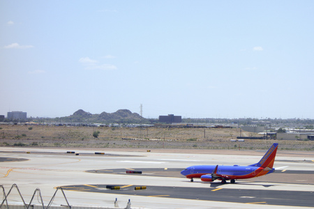 PHOENIX, US - MAY 23, 2015: Boeing-737 in Canyon Blue Livery of Southwest Airlines on tarmac in Phoenix Sky Harbor Airport, Arizonaのeditorial素材