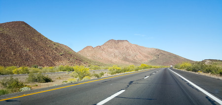 Buttes and low rise mountains along Interstate-10 east of city of Quartzsite.in Arizona desert...