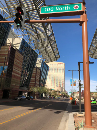 PHOENIX, AZ - DECEMBER 11, 2017: Traffic light and street sign next to Phoenix Convention Center North Buildingのeditorial素材