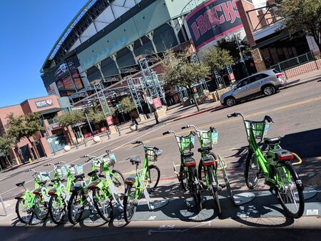 PHOENIX, AZ - JANUARY 22, 2019: Quick bicycle rental stand in Phoenix downtown next to home of the Arizona Diamondbacks Chase Arenaのeditorial素材