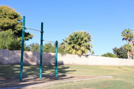 Fitness equipment with different height outdoor pull up bars in Conocido Park in southwestern city...