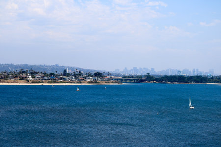Cityscape of city of San Diego as seen from north side of Mission Bay, California in Summerの写真素材