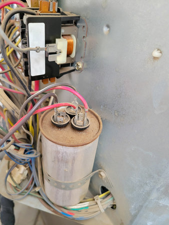 Air conditioner and heat pump electrical wiring with a contactor plus dual-run capacitor for a...