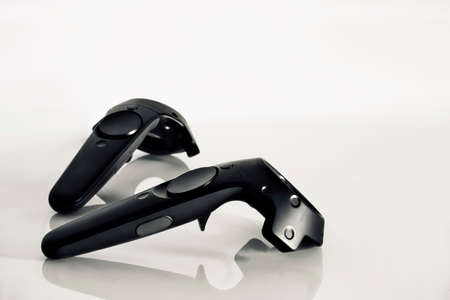 A closeup of a the   virtual reality controllers on a white backgroundの写真素材