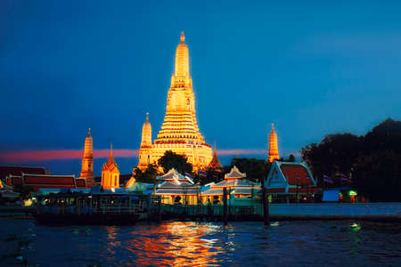 Wat Arun Temple at sunset in bangkok Thailand .の写真素材