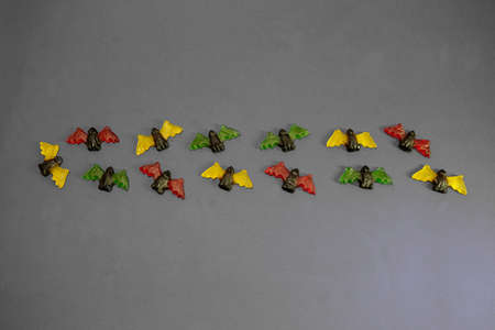 multicolored gummy jelly bat candies over dark backgroundの写真素材