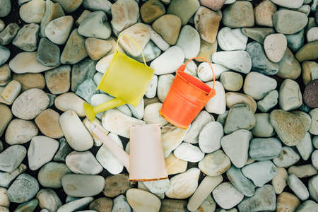 Colorful watering cans for plants at flowersの写真素材