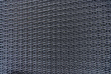 Gray brown synthetic rattan texture weaving background