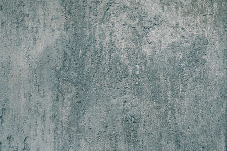 Grunge gray wall with natural concrete cement texture backgroundの写真素材
