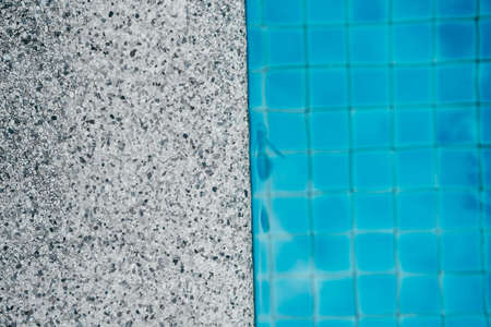 Pure blue water the pool. Water caustic backgroundの写真素材