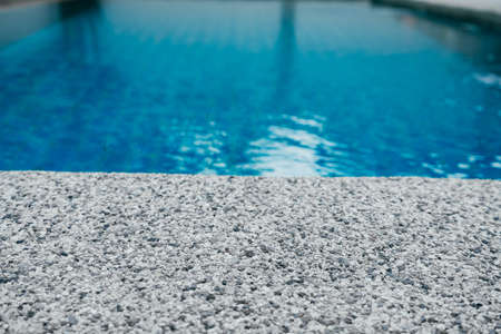 Pure blue water the pool. Water caustic background