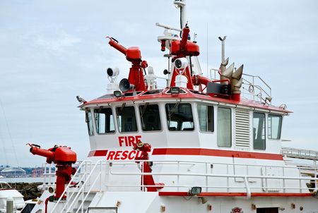 White and red fire rescue boat (docked)の写真素材