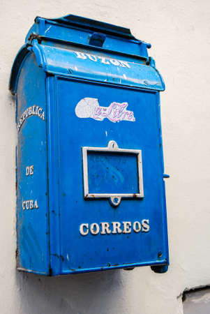 Havana, Cuba, March 14th 2011: Blue mailbox with worn Coca Cola sticker in Cubaのeditorial素材