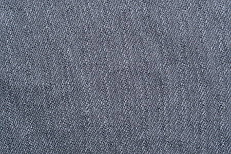 Dark gray cotton clothing fabric background textureの写真素材