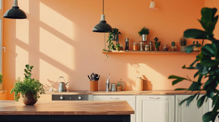 A kitchen with a white wall and orange accents. The kitchen has a wooden island with three stools and three hanging lightsの素材