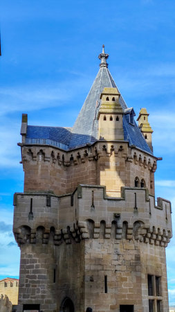 A beautiful ancient tower stands tall in Bardenas Reales, Navarra, showcasing stunning stonework and...