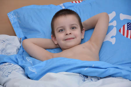 Sleep time, baby in a bedの写真素材