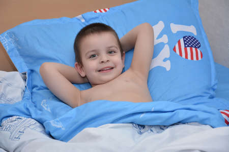 Sleep time, baby in a bedの写真素材