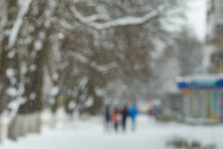 People on the streets of the city. Snow. Blurred pictureの写真素材