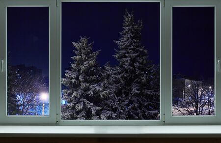 Beautiful Christmas tree for the large windowの写真素材