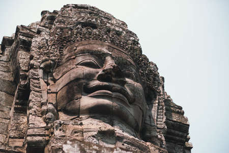 The Bayon is a well-known and richly decorated Khmer temple at Angkor in Cambodia.の写真素材