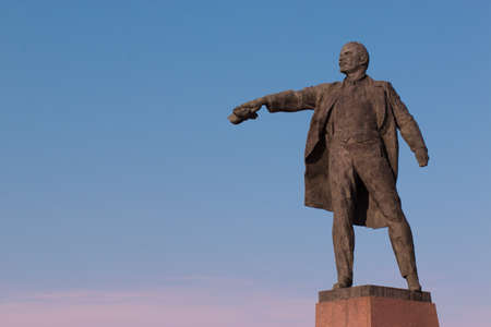 Sculpture of Vladimir Ilyich Lenin in the town square. Concept for printing leaflets, banners, cards, with place for text. SAINT-PETERSBURG, RUSSIA - 7 APRIL 2019.のeditorial素材