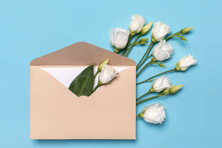 Spring romantic concept. Flat lay branch of flower lisantius or eustoma of white color in an...