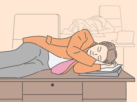 Man is sleeping at the table in officeのイラスト素材