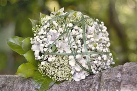 Wedding bouquet before the ceremony awaiting the brideの写真素材