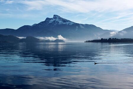 Lake in the Austrian mountains in the morning sunの写真素材