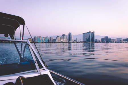 View from the boat to downtown real estate buildings of batumi.Georgian vegas and black sea baot...