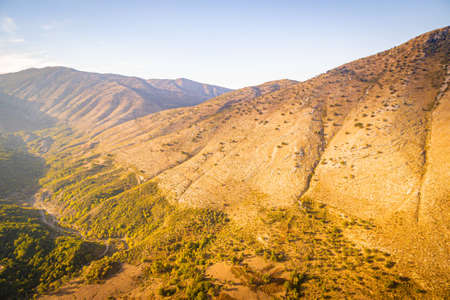 Dramatic views of the mountains from aerial perspective during the sunset.Albania adventure travels.の写真素材