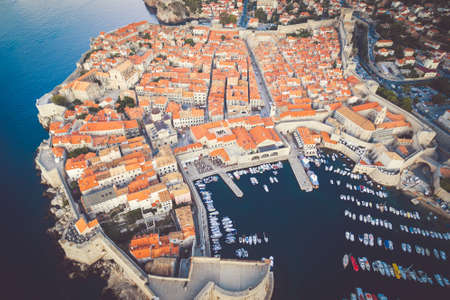 Aerial view down to the port of DUBROVNIK with many ships standing in a sunny day. Cruise and travel in Croatia.の写真素材