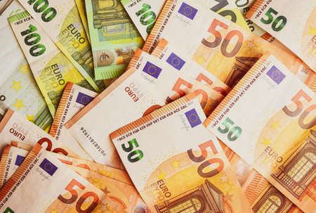 Euro Money Banknotes background texture. Fifty and one hundred banknotes only.の写真素材