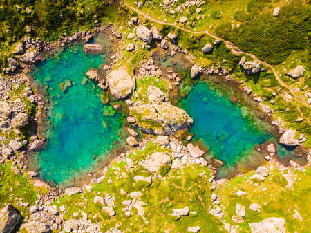 Top down aerial scenic view glacier Abudelauri green lake in KAzbegi national park, Georgia, Caucasusの写真素材