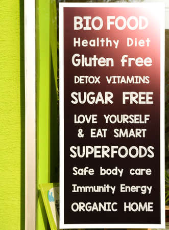 Billboard on healthy foods store facade with inspirational quotes healthy food promoting conceptの写真素材