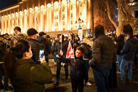 Tbilisi, Georgia - 1st march, 2022: : Hundreds of people stand for Ukrainian people against Russian troops attack and invasion on Ukraineのeditorial素材