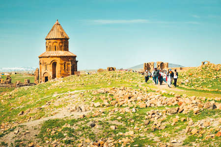 Kars, Turkey - 19th may, 2022: Church structure with organized tour group . Ani ruins archeological site eastern anatolia, Turkeyのeditorial素材