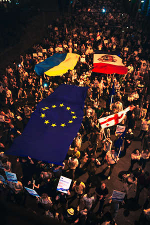 Tbilisi, Georgia - 20th June, 2022: Aerial view people march in streets on major EU-pro rally event. Thousands of people on peaceful demonstration event. Pro-Europe rally event in capital city Georgia Pro-Europe protesters appeal EU councilのeditorial素材