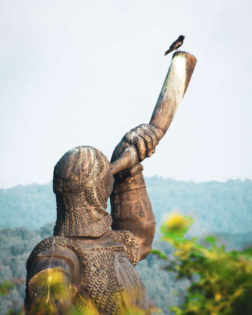 Giant soldier holding horn statue monument in Didgori - historical site memorial. Georgia historical sightseeing landmarksのeditorial素材