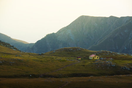 Mountain shelter hut to stay overnight in cold mountains. Lagodekhi national park hiking trail to black rock lakeの写真素材