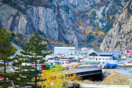 30th october, 2022: Lars border, Georgia - lorries drive stand by georgian-russian border check point Georgia side. Russian Ukrainian war crisis and russians emigration conceptの写真素材