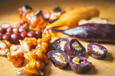 Close up image of Sliced peaces of Churchkhela on the wooden surface and blank space background. Georgian delicasy and traditional dishes in Caucasus.の写真素材