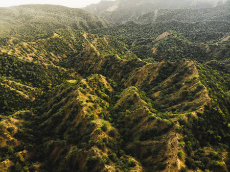 Aerial cinematic top view mountain canyons. Stone texture and pattern with sunset over horizon.Vashlovani national parkの写真素材